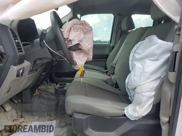 2017 Ford F-150 XL with VIN 1FTEX1E84HFA89246, listed as a Copart auction lot 51605915 with 98,702 mi miles and Salvage title. Bid and sale history available at DreamBid. Image 7.