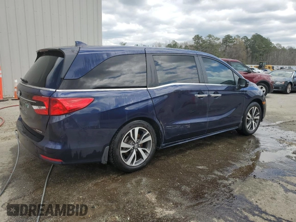 2021 Honda Odyssey Touring with VIN 5FNRL6H83MB028717, listed as a Copart auction lot 49236485 with 63,576 mi miles and Salvage Title. Bid and sale history available at carsss.com. Image 3.