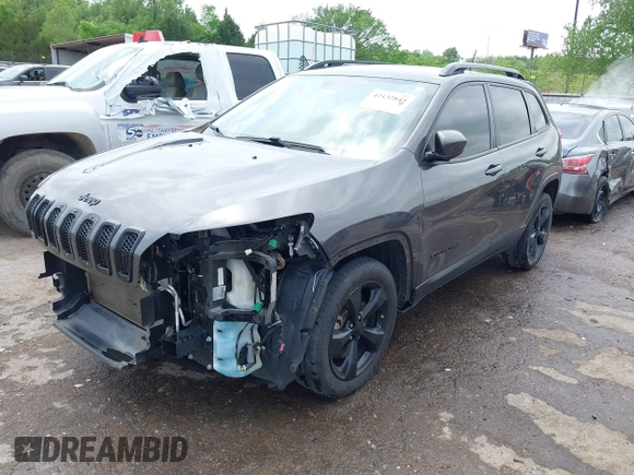 2018 Jeep Cherokee Latitude with VIN 1C4PJLCB2JD595549, listed as a IAAI auction lot 42132845 with 139,819 mi miles and . Bid and sale history available at DreamBid. Image 2.