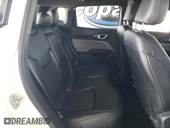 2023 Jeep Compass Latitude z VIN 3C4NJDBN0PT561850, wystawiony jako Copart lot #60563465 z przebiegiem 50 881 mil mil oraz Czysty tytuł • Clean title. Historia ofert i sprzedaży dostępna na DreamBid. Obrazek 10.