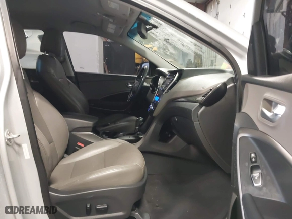 2013 Hyundai Santa Fe 2.0T Sport with VIN 5XYZUDLA1DG002296, listed as a IAAI auction lot 41348109 with 130,626 mi miles. Bid and sale history available at carsss.com. Image 5.