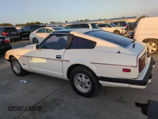 1983 Datsun 280ZX z VIN JN1HZ04S2DX564639, wystawiony jako Copart lot #75222314 z przebiegiem 75 925 mil mil oraz Szkody całkowita. Historia ofert i sprzedaży dostępna na DreamBid. Obrazek 2.