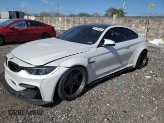 2015 BMW M4 with VIN WBS3R9C58FK330635, listed as a Copart auction lot 50525664 with 47,100 mi miles. Bid and sale history available at carsss.com. Image 1.