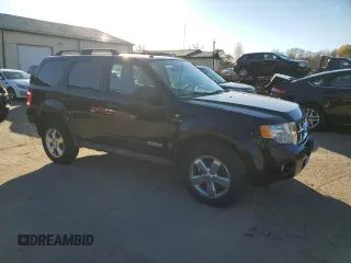 2008 Ford Escape XLT with VIN 1FMCU93168KD23345, listed as a Copart auction lot 77482674 with 142,607 mi miles and Clean title. Bid and sale history available at DreamBid. Image 4.