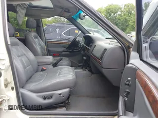1997 Jeep Grand Cherokee Limited z VIN 1J4GZ78S1VC536295, wystawiony jako IAAI lot #42435292 z przebiegiem 310 005 mil mil oraz . Historia ofert i sprzedaży dostępna na DreamBid. Obrazek 5.