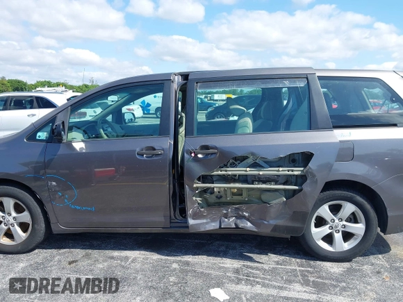 2012 Toyota Sienna with VIN 5TDZK3DC8CS190719, listed as a IAAI auction lot 41983695 with 68,377 mi miles and . Bid and sale history available at DreamBid. Image 15.