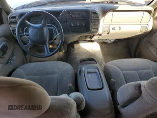 1999 GMC Yukon with VIN 1GKEC13R0XJ811710, listed as a Copart auction lot 43014995 with 311,948 mi miles and Salvage Title. Bid and sale history available at carsss.com. Image 8.