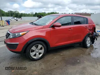 2012 Kia Sportage LX z VIN KNDPB3A27C7230060, wystawiony jako Copart lot #56720495 z przebiegiem 170 074 mil mil oraz Nie do naprawy • Non repairable. Historia ofert i sprzedaży dostępna na DreamBid. Obrazek 1.