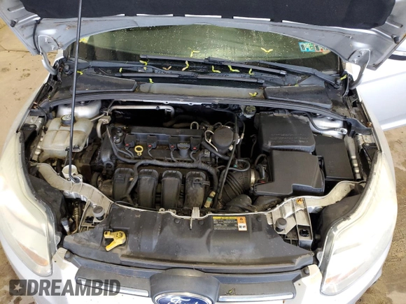 2013 Ford Focus SE z VIN 1FADP3F26DL314690, wystawiony jako Copart lot #58408575 z przebiegiem Nie podano mil oraz Szkoda całkowita • Salvage title. Historia ofert i sprzedaży dostępna na DreamBid. Obrazek 11.