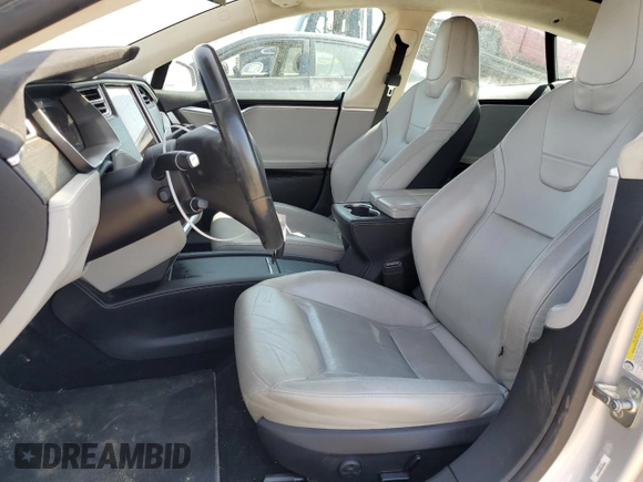 2016 Tesla Model S 90D with VIN 5YJSA1E25GF142104, listed as a Copart auction lot 50874815 with 84,917 mi miles and Salvage Title. Bid and sale history available at DreamBid. Image 7.