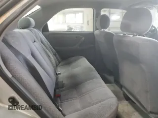 2001 Toyota Camry LE z VIN 4T1BF28K21U963819, wystawiony jako Copart lot #54551465 z przebiegiem 199 472 mil mil oraz Szkoda całkowita • Salvage title. Historia ofert i sprzedaży dostępna na DreamBid. Obrazek 10.