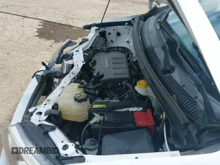 2018 Chevrolet Sonic Premier z VIN 1G1JF6SB6J4121932, wystawiony jako IAAI lot #42502568 z przebiegiem 93 055 mil mil oraz . Historia ofert i sprzedaży dostępna na DreamBid. Obrazek 22.