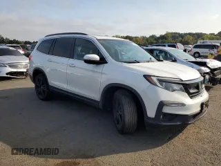 2021 Honda Pilot Special Edition with VIN 5FNYF6H27MB102574, listed as a Copart auction lot 71641744 with 34,772 mi miles and Salvage Title. Bid and sale history available at DreamBid. Image 4.