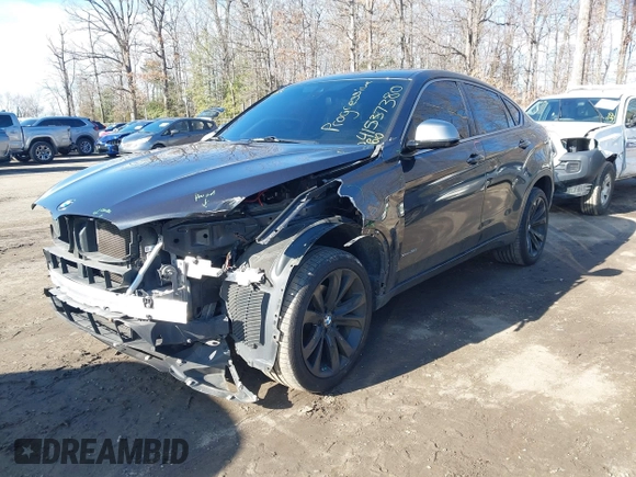 2019 BMW X6 xDrive35i z VIN 5UXKU2C51K0Z64589, wystawiony jako IAAI lot #41537380 z przebiegiem 60 769 mil mil oraz . Historia ofert i sprzedaży dostępna na DreamBid. Obrazek 2.