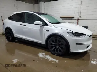 2023 Tesla Model X with VIN 7SAXCDE5XPF381338, listed as a Copart auction lot 51638855 with 1,570 mi miles and Clean Title. Bid and sale history available at carsss.com. Image 4.
