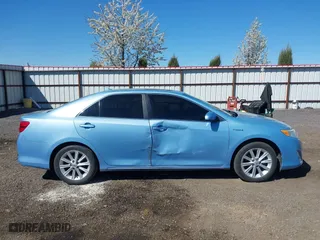 2014 Toyota Camry Hybrid LE with VIN 4T1BD1FK7EU098824, listed as a IAAI auction lot 42063119 with 112,759 mi miles. Bid and sale history available at carsss.com. Image 13.