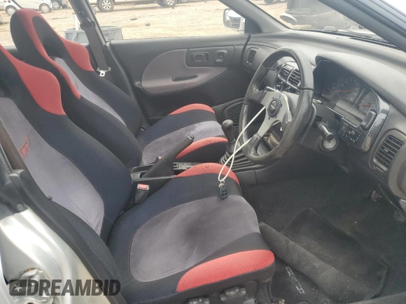1995 Subaru Impreza with VIN GC8030988, listed as a Copart auction lot 70242354 with 123,696 mi miles and Salvage title. Bid and sale history available at DreamBid. Image 7.