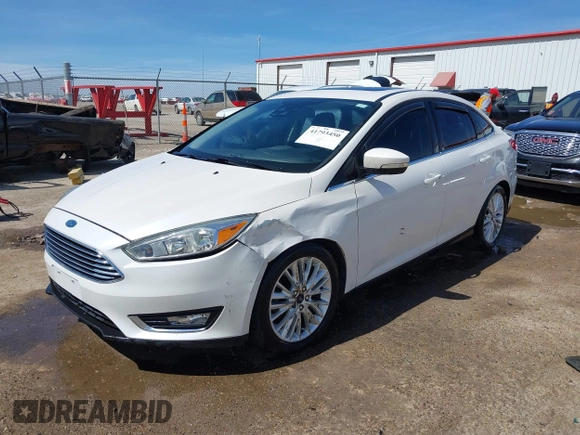 2015 Ford Focus Titanium с VIN 1FADP3J27FL341102, выставлен на аукционе IAAI как лот 41793450 с пробегом 96 465 миль миль и . История ставок и продаж доступна на DreamBid. Изображение 17.