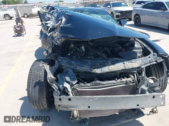 2014 Chevrolet Camaro LS z VIN 2G1FA1E32E9126043, wystawiony jako IAAI lot #42253189 z przebiegiem 104 457 mil mil oraz . Historia ofert i sprzedaży dostępna na DreamBid. Obrazek 17.