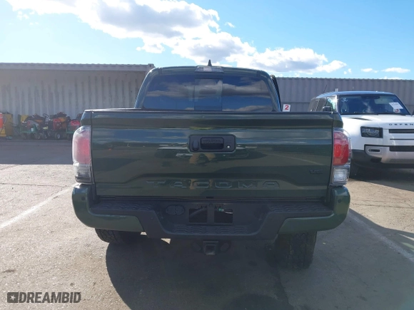 2021 Toyota Tacoma 4WD SR with VIN 3TMCZ5AN4MM401998, listed as a IAAI auction lot 41712813 with 91,371 mi miles. Bid and sale history available at carsss.com. Image 17.