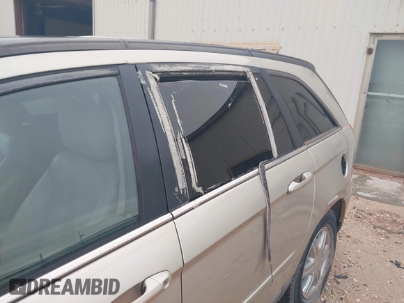 2005 Chrysler Pacifica Touring z VIN 2C4GF68475R658287, wystawiony jako IAAI lot #42440152 z przebiegiem 224 347 mil mil oraz . Historia ofert i sprzedaży dostępna na DreamBid. Obrazek 13.