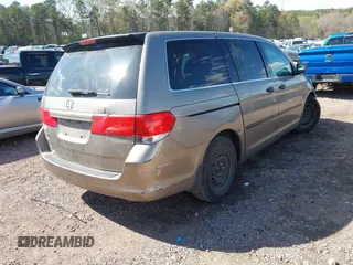 2010 Honda Odyssey LX with VIN 5FNRL3H25AB018051, listed as a IAAI auction lot 41886393 with 256,554 mi miles. Bid and sale history available at carsss.com. Image 4.