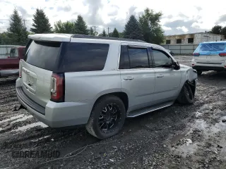 2015 GMC Yukon SLT with VIN 1GKS2BKC9FR518381, listed as a Copart auction lot 66352864 with 103,419 mi miles and Salvage Title. Bid and sale history available at carsss.com. Image 3.
