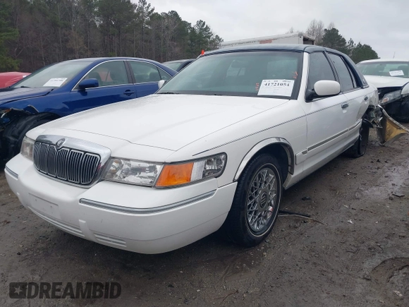 1999 Mercury Grand Marquis GS z VIN 2MEFM74W9XX622371, wystawiony jako IAAI lot #41721054 z przebiegiem 131 724 mil mil oraz . Historia ofert i sprzedaży dostępna na DreamBid. Obrazek 17.