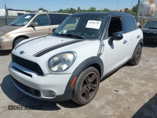 2011 MINI Countryman S z VIN WMWZC3C50BWM26002, wystawiony jako IAAI lot #42383758 z przebiegiem 188 443 mil mil oraz . Historia ofert i sprzedaży dostępna na DreamBid. Obrazek 2.