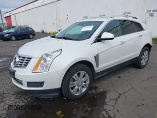 2016 Cadillac SRX Luxury Collection z VIN 3GYFNBE33GS507014, wystawiony jako IAAI lot #41979980 z przebiegiem 115 077 mil mil oraz . Historia ofert i sprzedaży dostępna na DreamBid. Obrazek 2.