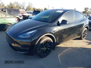 2024 Tesla Model Y Long Range with VIN 7SAYGDEEXRA216186, listed as a IAAI auction lot 41106653 with 25,331 mi miles and . Bid and sale history available at DreamBid. Image 19.