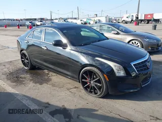 2014 Cadillac ATS Standard RWD with VIN 1G6AA5RX0E0111849, listed as a IAAI auction lot 41464201 with 117,565 mi miles. Bid and sale history available at carsss.com. Image 1.