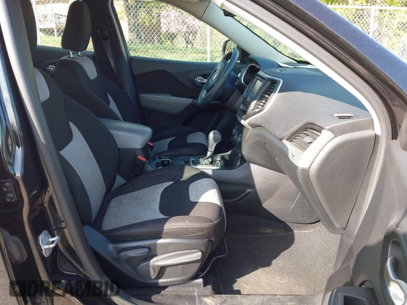 2014 Jeep Cherokee Sport with VIN 1C4PJLAB4EW110051, listed as a IAAI auction lot 41961698 with 153,570 mi miles and . Bid and sale history available at DreamBid. Image 5.