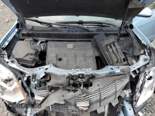 2011 Cadillac SRX Premium Collection with VIN 3GYFNFEY3BS585014, listed as a Copart auction lot 63872065 with 140,680 mi miles and Salvage title. Bid and sale history available at DreamBid. Image 12.