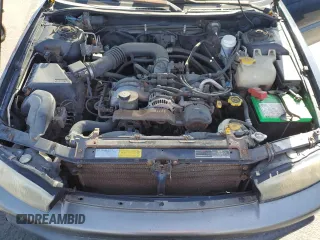 1996 Subaru Legacy with VIN 4S3BG4859T6986223, listed as a Copart auction lot 57683345 with 265,568 mi miles and Salvage title. Bid and sale history available at DreamBid. Image 12.