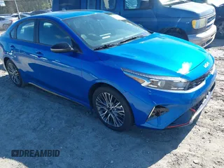 2023 Kia Forte GT-Line z VIN 3KPF54AD5PE686851, wystawiony jako IAAI lot #42002860 z przebiegiem 18 411 mil mil oraz . Historia ofert i sprzedaży dostępna na DreamBid. Obrazek 1.