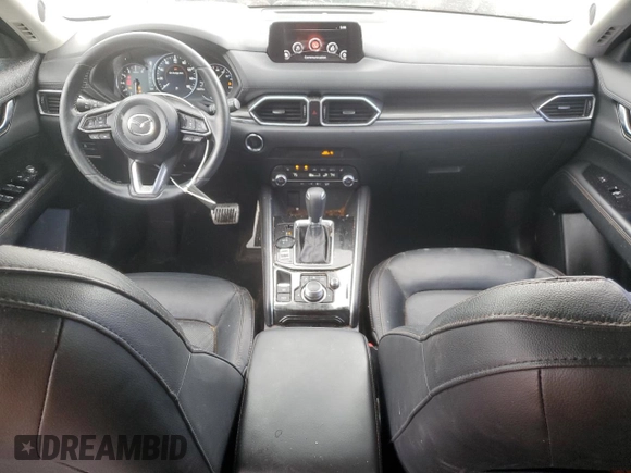 2019 Mazda CX-5 Grand Touring with VIN JM3KFBDM4K0669589, listed as a Copart auction lot 54948455 with 64,475 mi miles and Salvage Title. Bid and sale history available at carsss.com. Image 8.