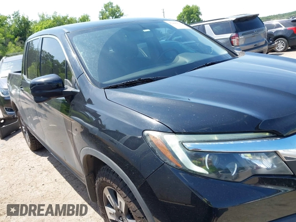 2018 Honda Ridgeline RTL-T with VIN 5FPYK3F67JB013171, listed as a IAAI auction lot 42498827 with 124,415 mi miles and . Bid and sale history available at DreamBid. Image 14.