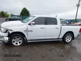 2018 Ram 1500 Lone Star Silver with VIN 1C6RR6LT1JS119520, listed as a IAAI auction lot 41968636 with 114,681 mi miles and . Bid and sale history available at DreamBid. Image 14.