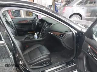 2016 Cadillac CTS Luxury Collection AWD with VIN 1G6AX5SX6G0111768, listed as a IAAI auction lot 41563991 with 76,718 mi miles and . Bid and sale history available at DreamBid. Image 5.