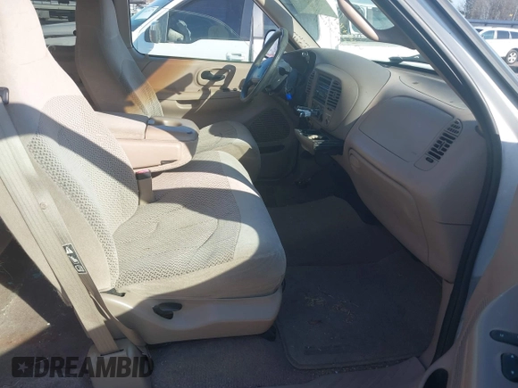 1999 Ford F-150 XL with VIN 1FTRX18L3XKB33860, listed as a IAAI auction lot 41664761 with 305,767 mi miles. Bid and sale history available at carsss.com. Image 5.