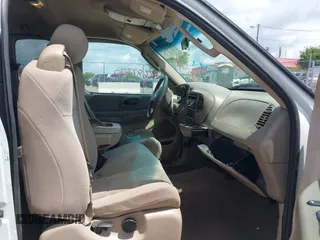 2002 Ford F-150 XL with VIN 1FTRX17W22NB88707, listed as a IAAI auction lot 42687327 with 185,481 mi miles and . Bid and sale history available at DreamBid. Image 5.