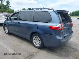 2015 Toyota Sienna XLE with VIN 5TDYK3DC3FS676919, listed as a IAAI auction lot 42475307 with 99,574 mi miles and . Bid and sale history available at DreamBid. Image 3.