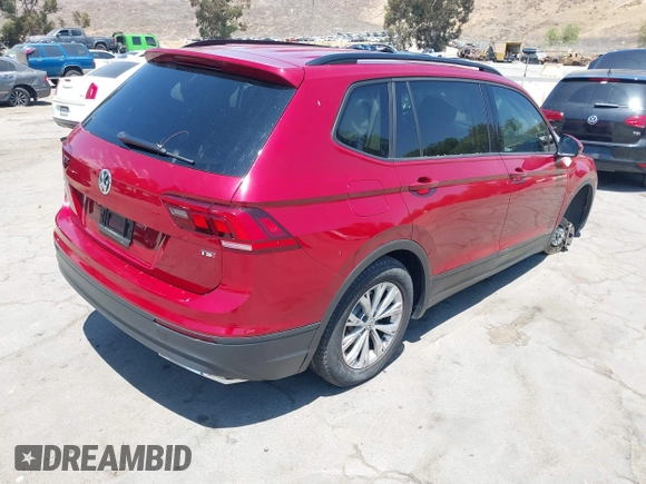 2018 Volkswagen Tiguan S with VIN 3VV1B7AX4JM043324, listed as a IAAI auction lot 42623550 with 62,858 mi miles and . Bid and sale history available at DreamBid. Image 4.