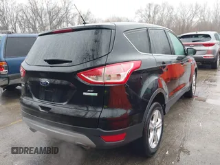 2014 Ford Escape SE with VIN 1FMCU0GX4EUE39511, listed as a IAAI auction lot 41477507 with 151,532 mi miles and . Bid and sale history available at DreamBid. Image 4.