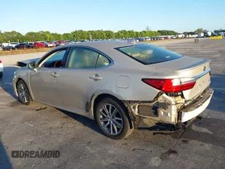 2016 Lexus ES 300h z VIN JTHBW1GG4G2106710, wystawiony jako IAAI lot #41684479 z przebiegiem 144 559 mil mil oraz . Historia ofert i sprzedaży dostępna na DreamBid. Obrazek 3.