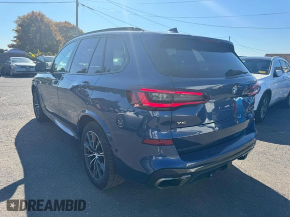 2021 BMW X5 M50i with VIN 5UXJU4C00M9H36466, listed as a Copart auction lot 77444344 with 100,119 mi miles and Clean Title. Bid and sale history available at carsss.com. Image 2.
