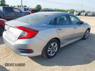 2018 Honda Civic LX with VIN 19XFC2F59JE024029, listed as a IAAI auction lot 42226509 with 85,115 mi miles and . Bid and sale history available at DreamBid. Image 4.