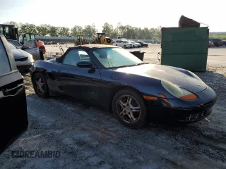 2000 Porsche Boxster с VIN WP0CA2989YU627749, выставлен на аукционе Copart как лот 54054305 с пробегом 189 173 миль миль и Списание • Salvage title. История ставок и продаж доступна на DreamBid. Изображение 4.
