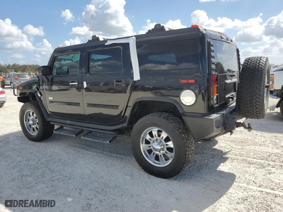 2003 Hummer H2 with VIN 5GRGN23U33H102570, listed as a Copart auction lot 77259654 with 0 mi miles and Salvage Title. Bid and sale history available at carsss.com. Image 2.